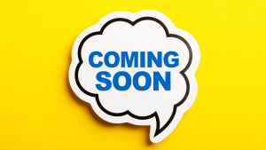 'Coming soon' written in a speech bubble on a yellow background